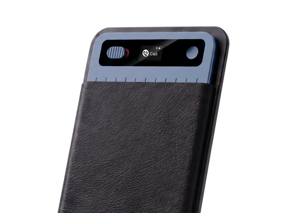 MeetGeek AI voice recorder in a leather sleeve