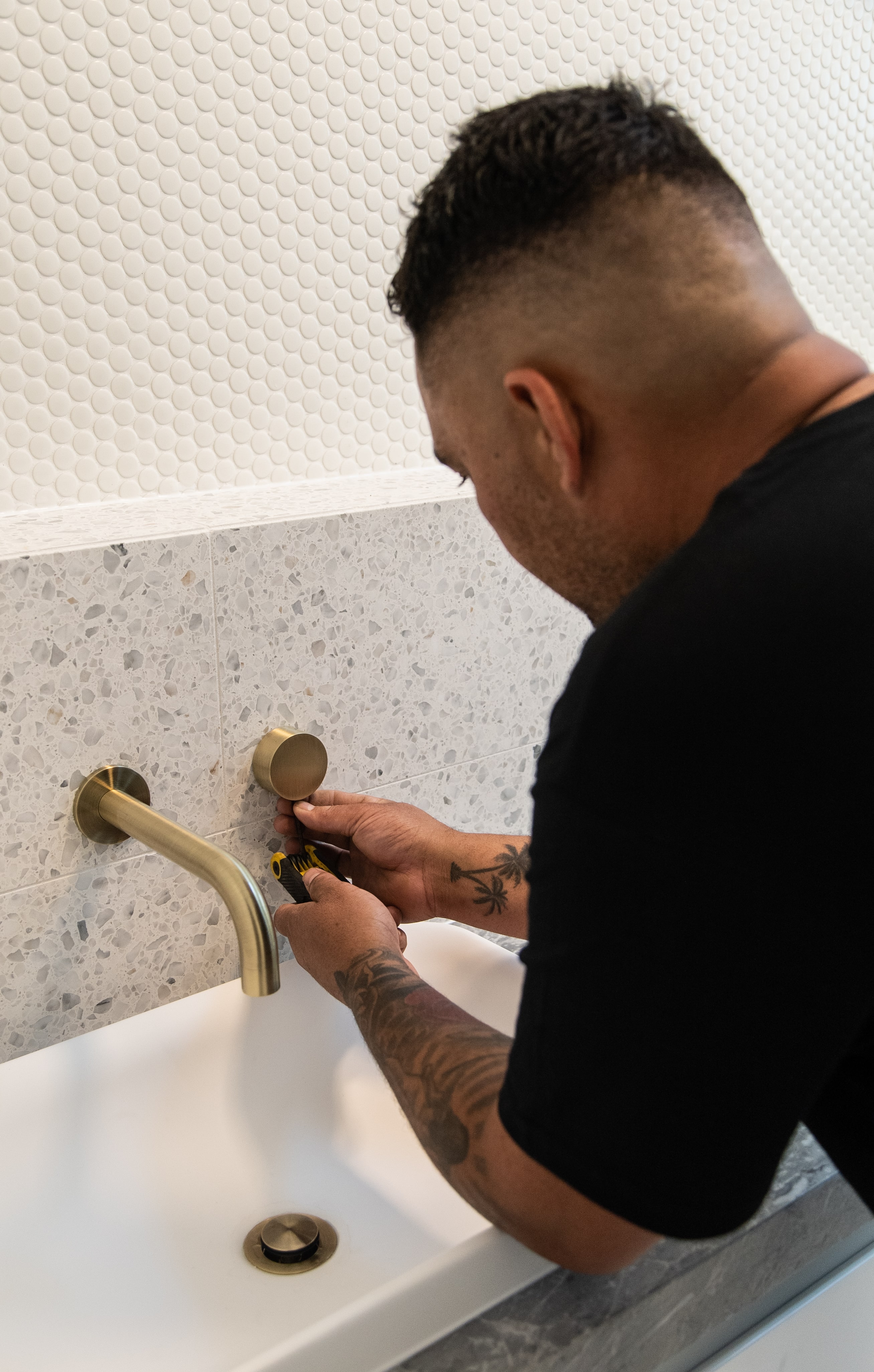 ed installing a water tap