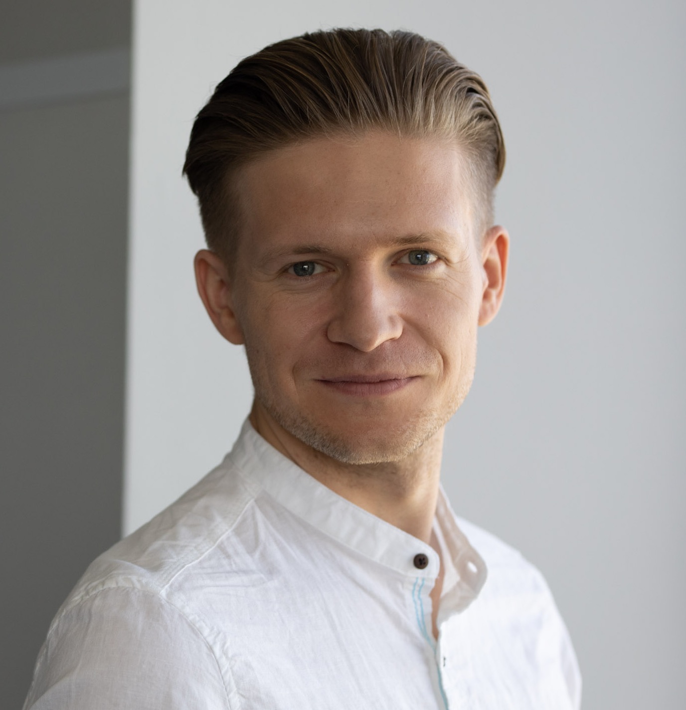 Photo of Adam Dubiel, Chief Product & Technology Officer at XTB