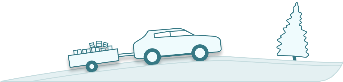 Bil kjører opp en bakke med en henger med pakker i seg