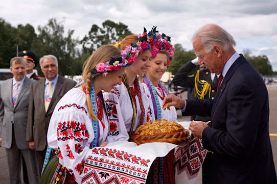 Welcoming guests with rushnyk Ukraine