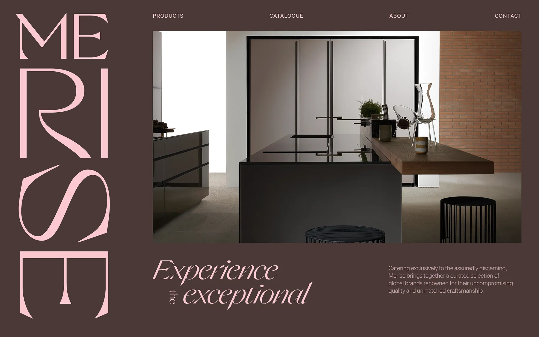 Modern minimalist kitchen with black cabinetry, a wooden floating countertop, and transparent chairs against a brick wall.