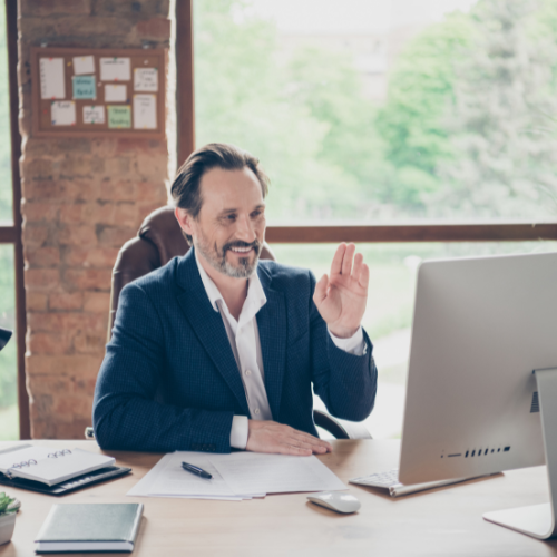An entrepreneur saying hello at the beginning of his session