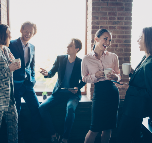 Business people laughing together and having a good time