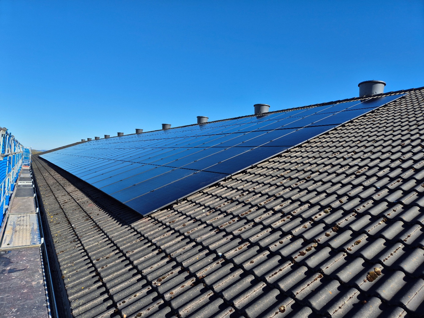 Solar panels installed on a tiled roof in Rogaland, Norway