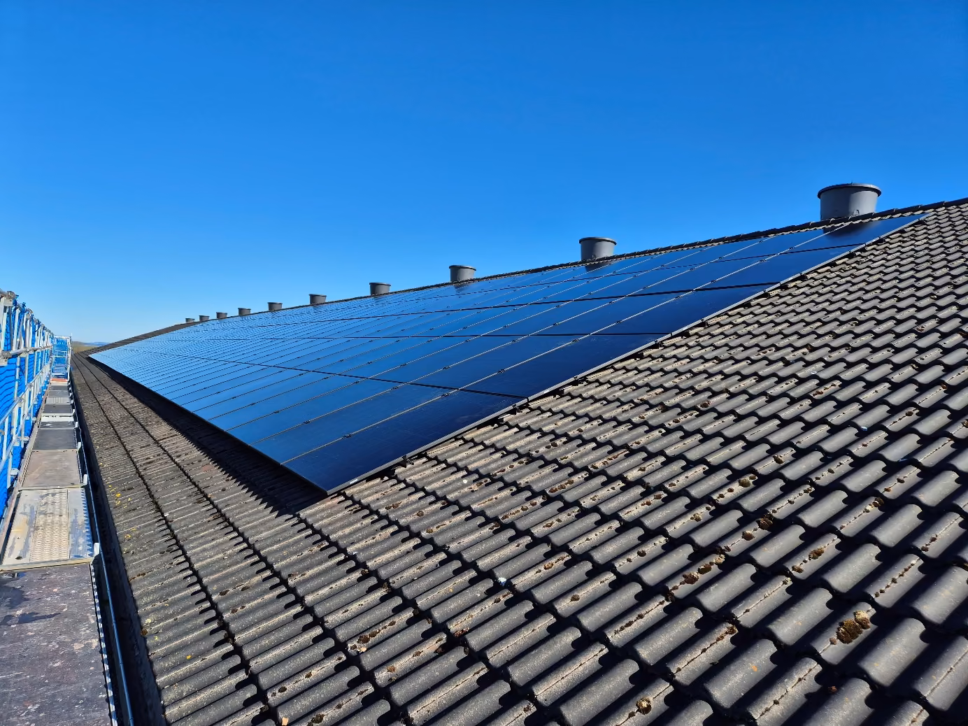 Solar panels installed on a tiled roof in Rogaland, Norway