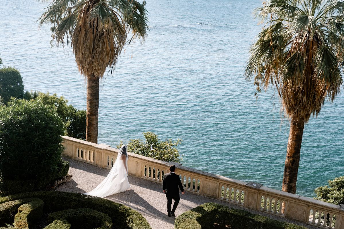 elopement couple strolling through gardens of isola del garda italy
