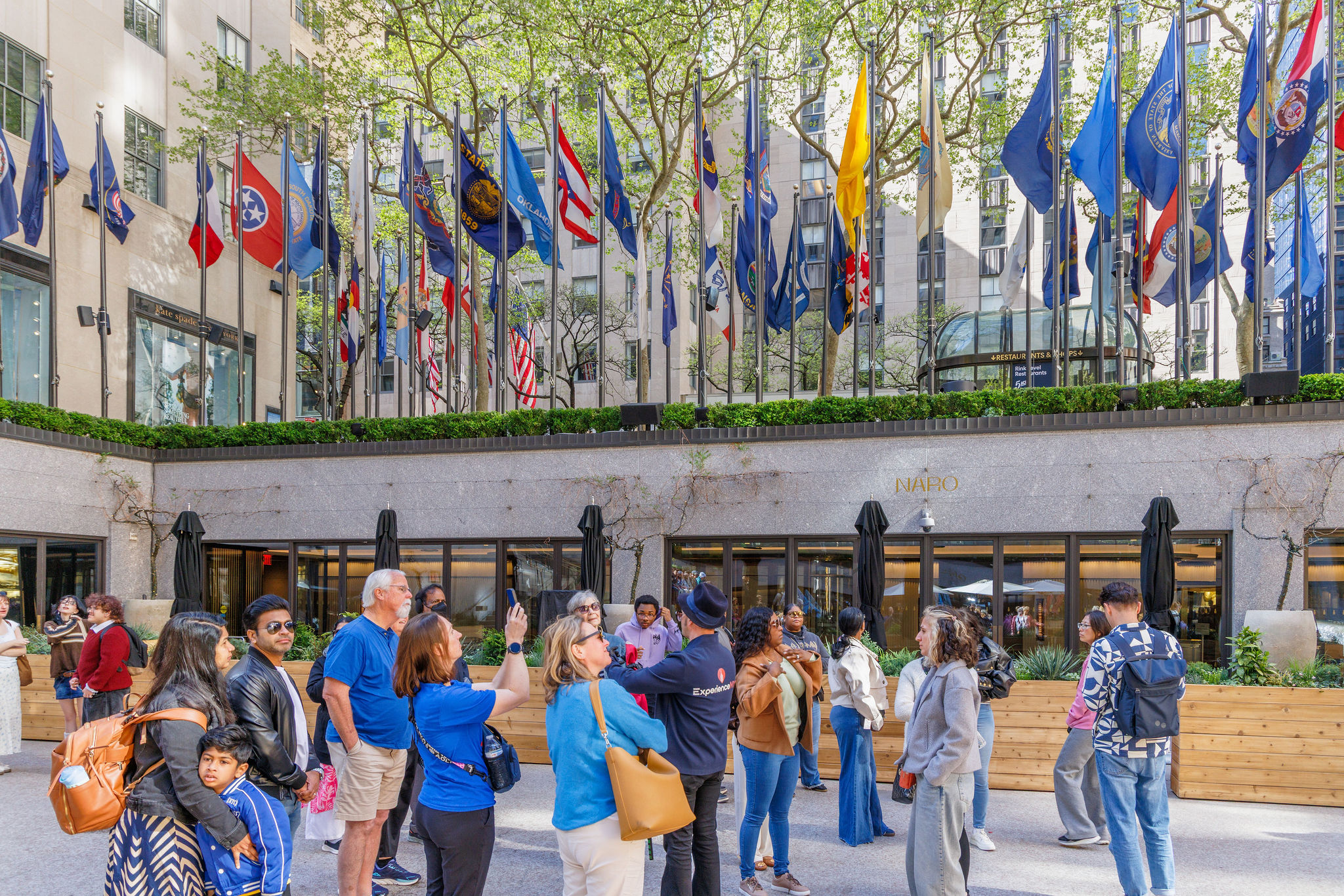 Tour guide speaking to group at Rockefeller Center