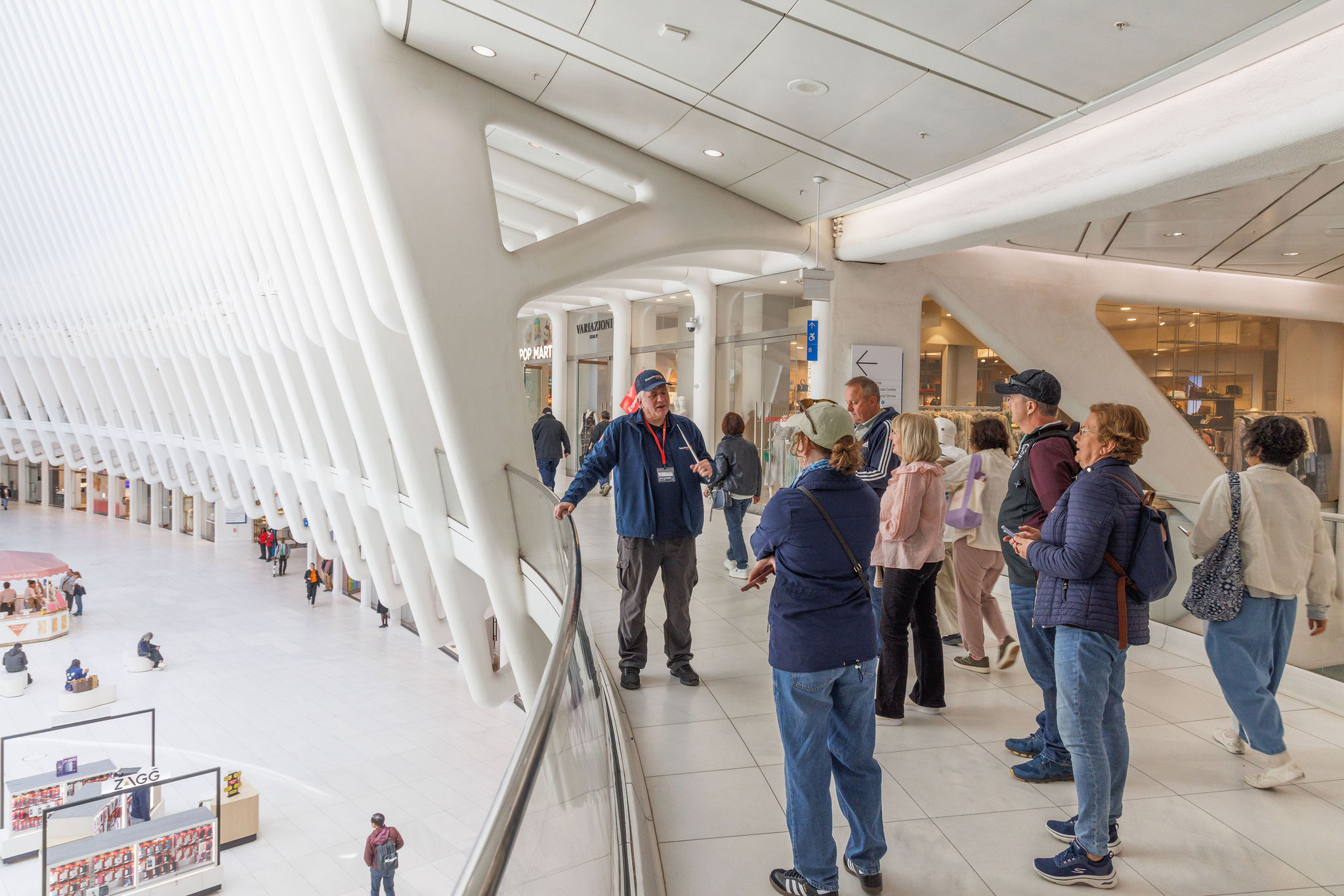 Tour guide with group on the second floor of Oculus in New York City
