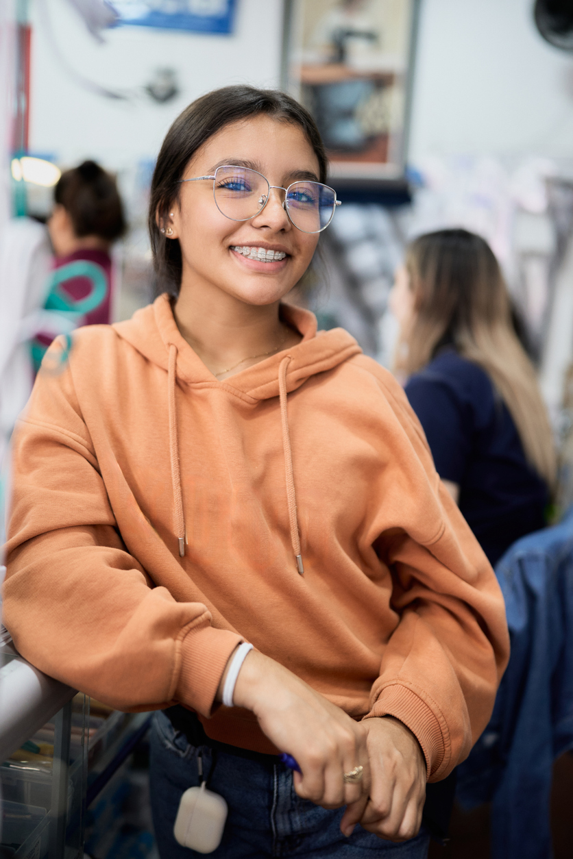 Teen with braces smiling