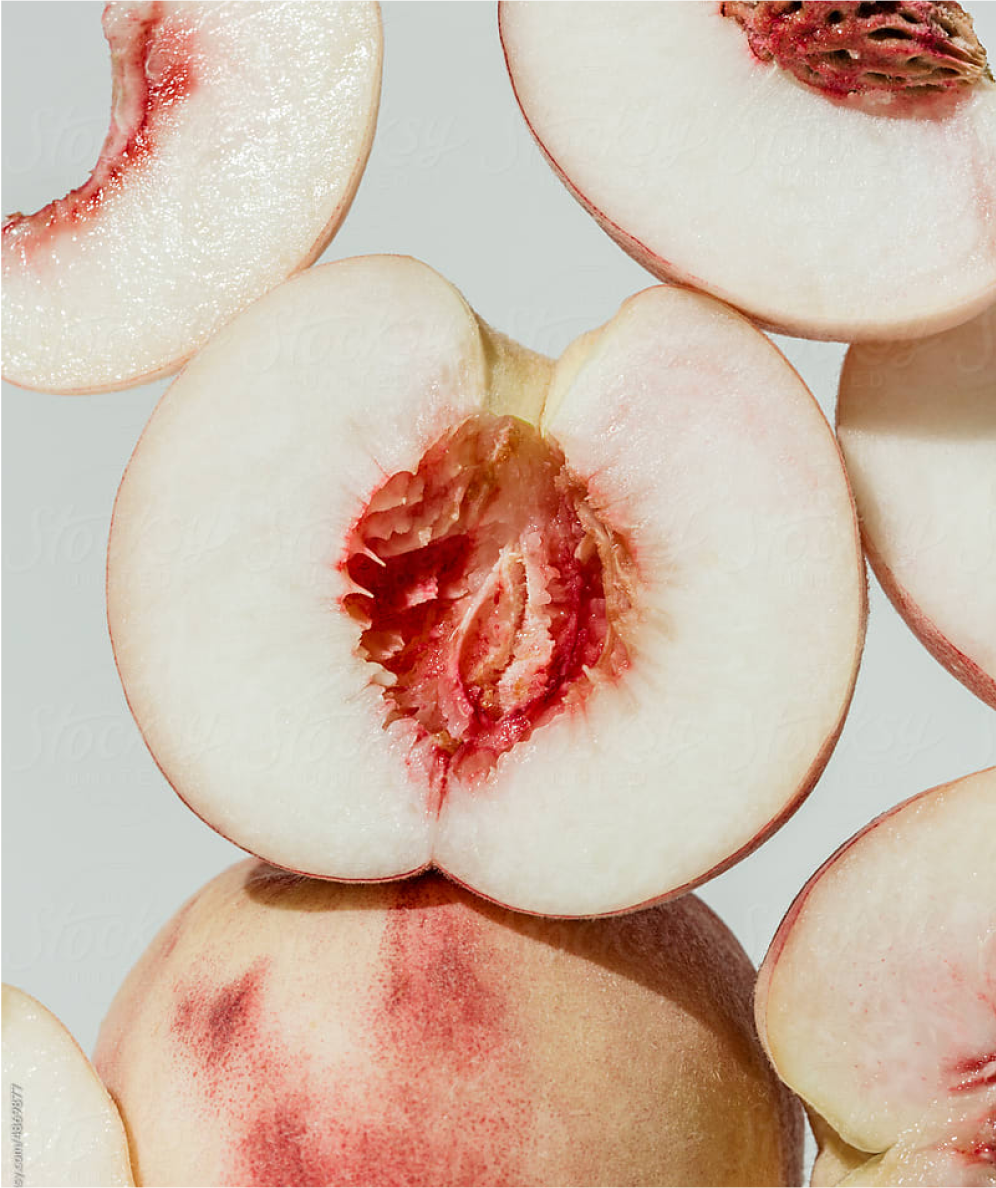 Sliced peaches stacked on top of each other in frame