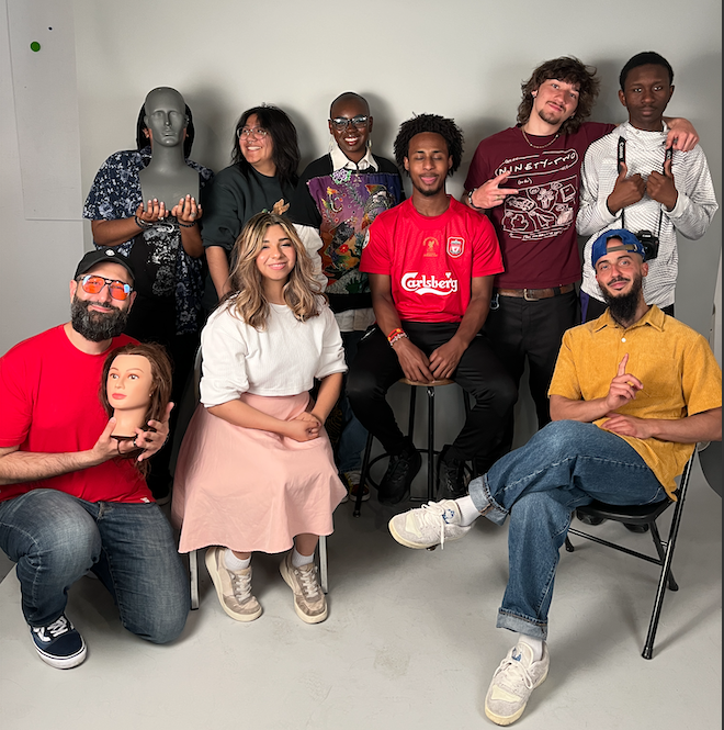 Group of 10 BIPOC students posing in front of a white background