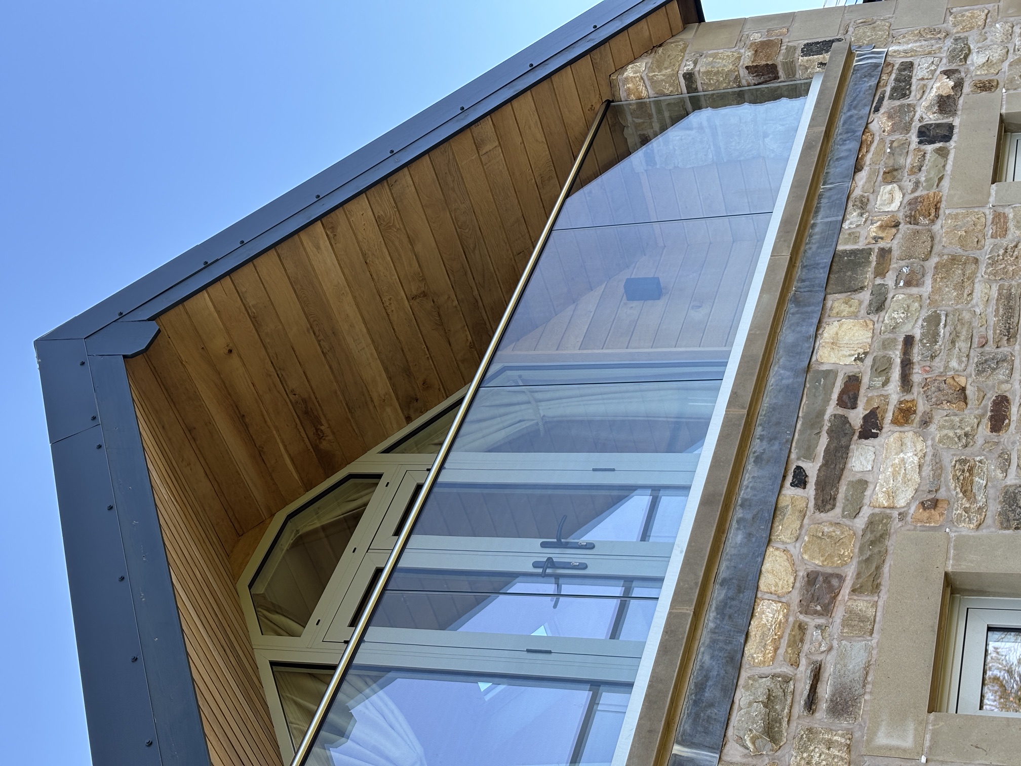 Oak clad balcony overhang