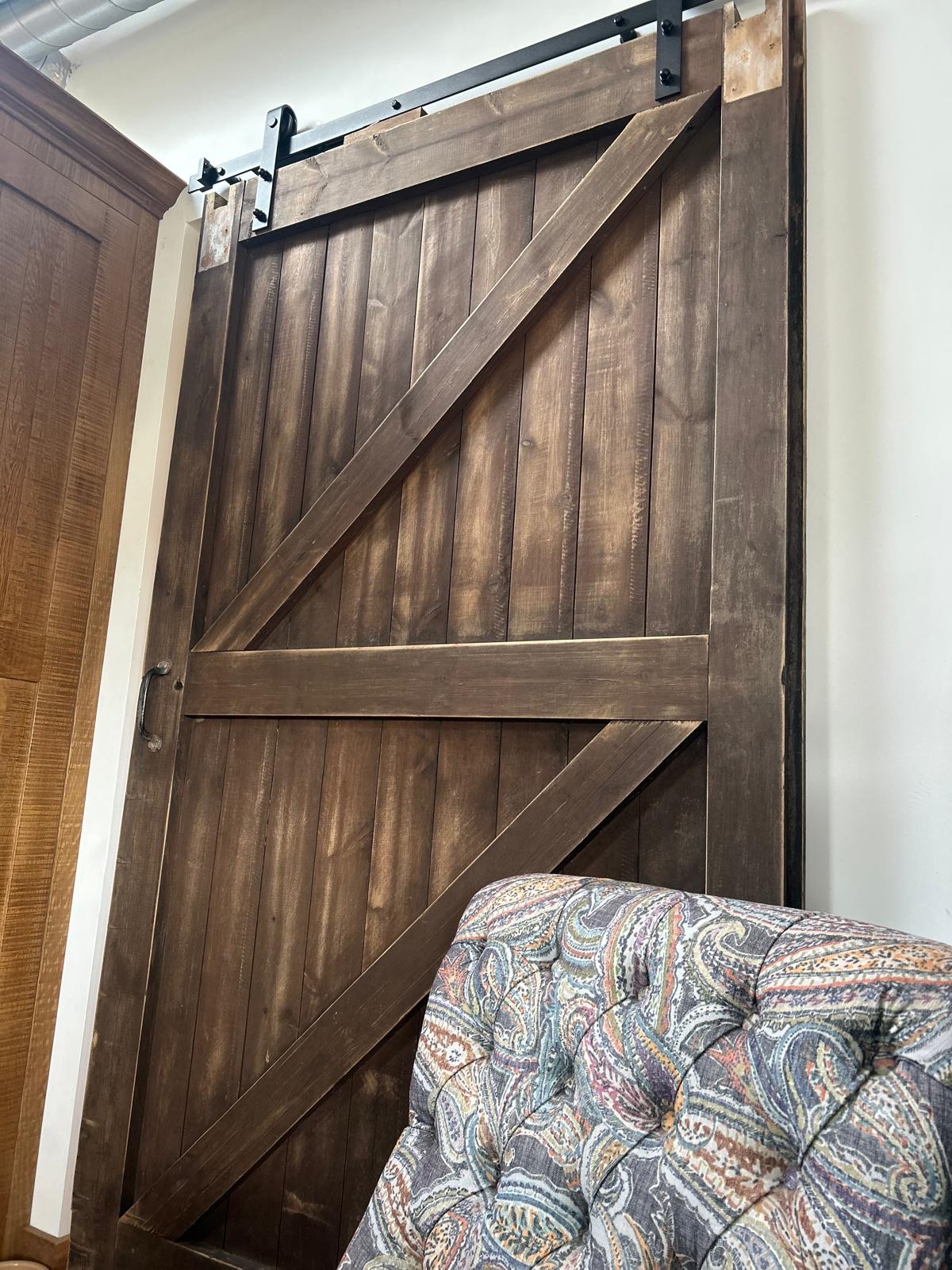 Old stable sliding door restored and reused.