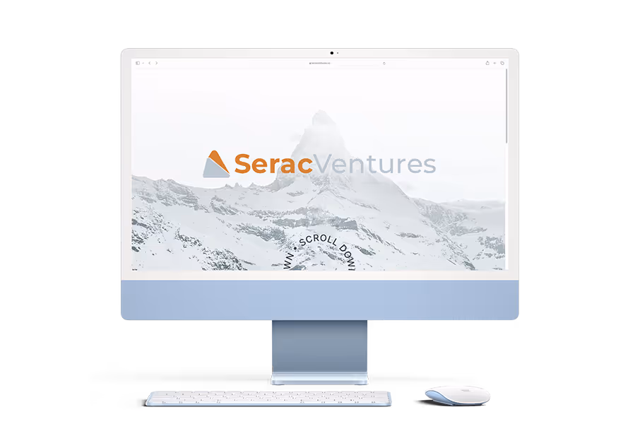 The homepage for Serac Ventures shows a sweeping snowy mountain vista, so high up, it's cloudy and misty. In the center of the page is the logo, and at the bottom is a circle of text that spins slowly reading "scroll down".