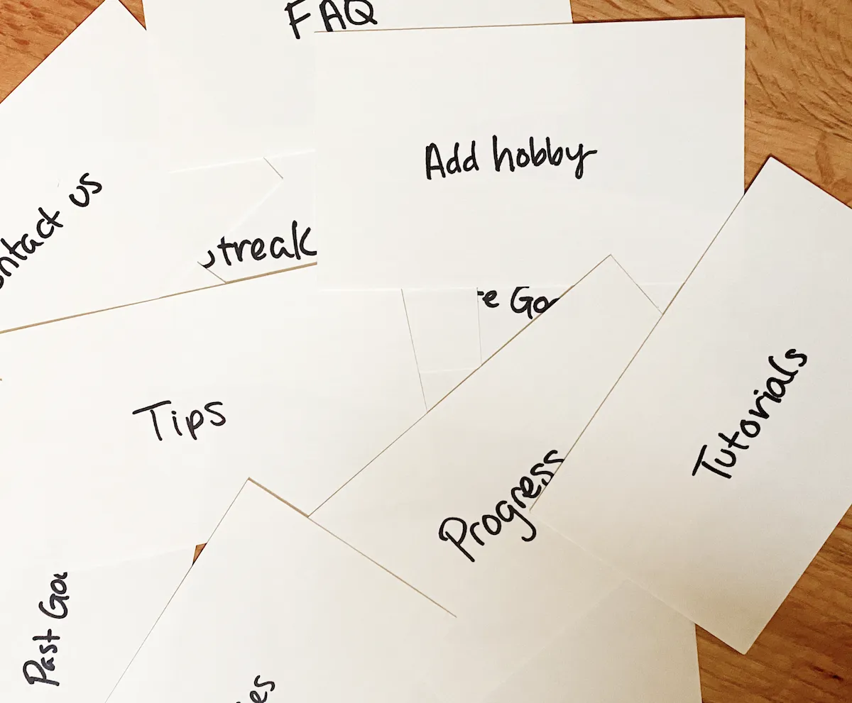 a photo of labeled notecards for card sorting