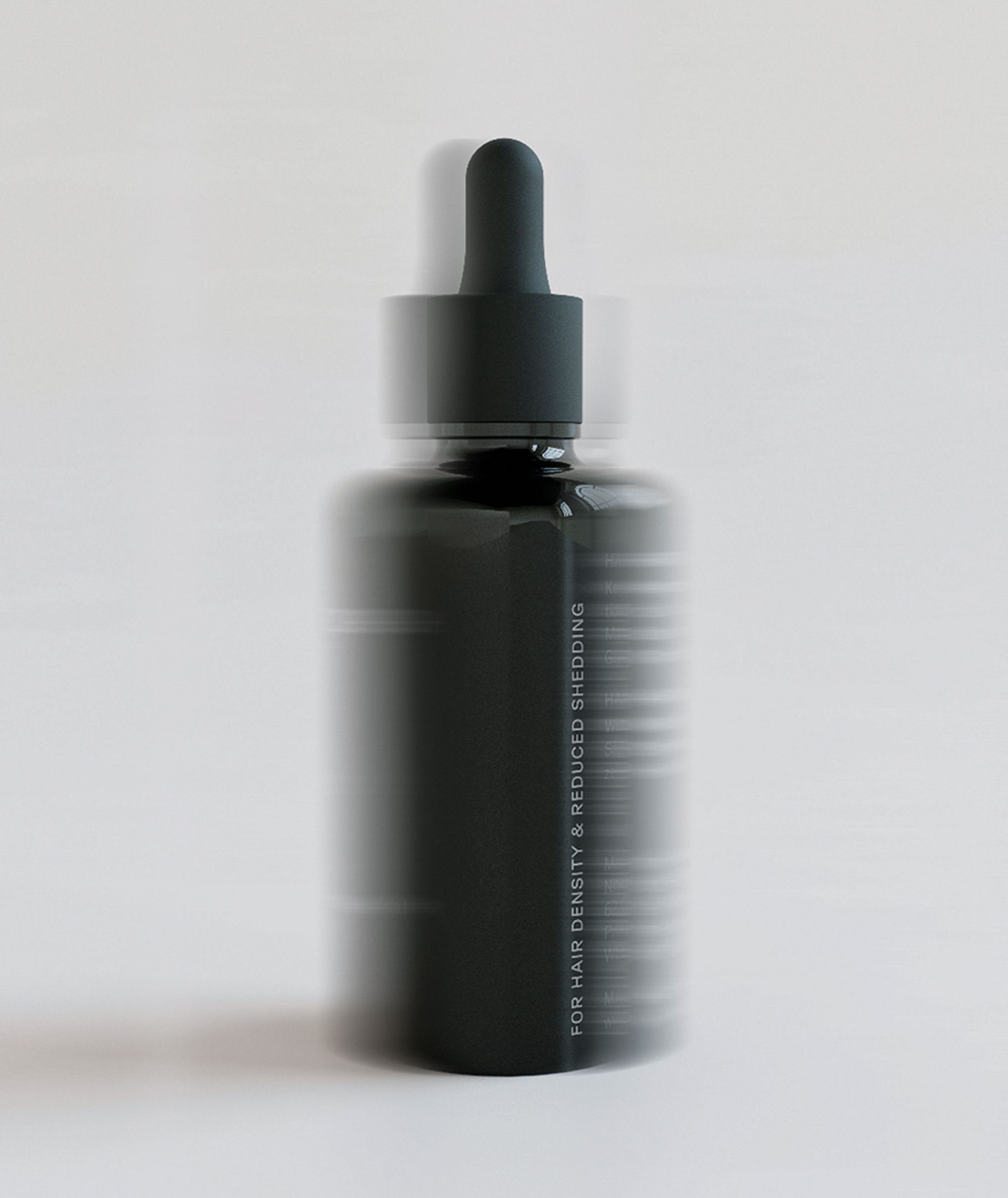 A hair serum bottle on white background with blurred sides
