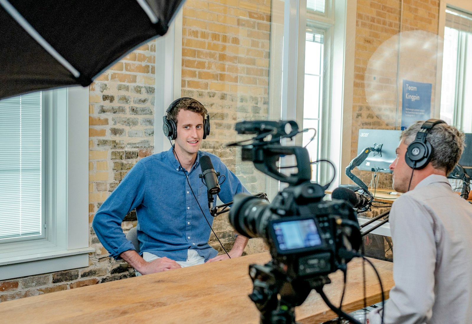 Recruiter on a headset working in a modern office