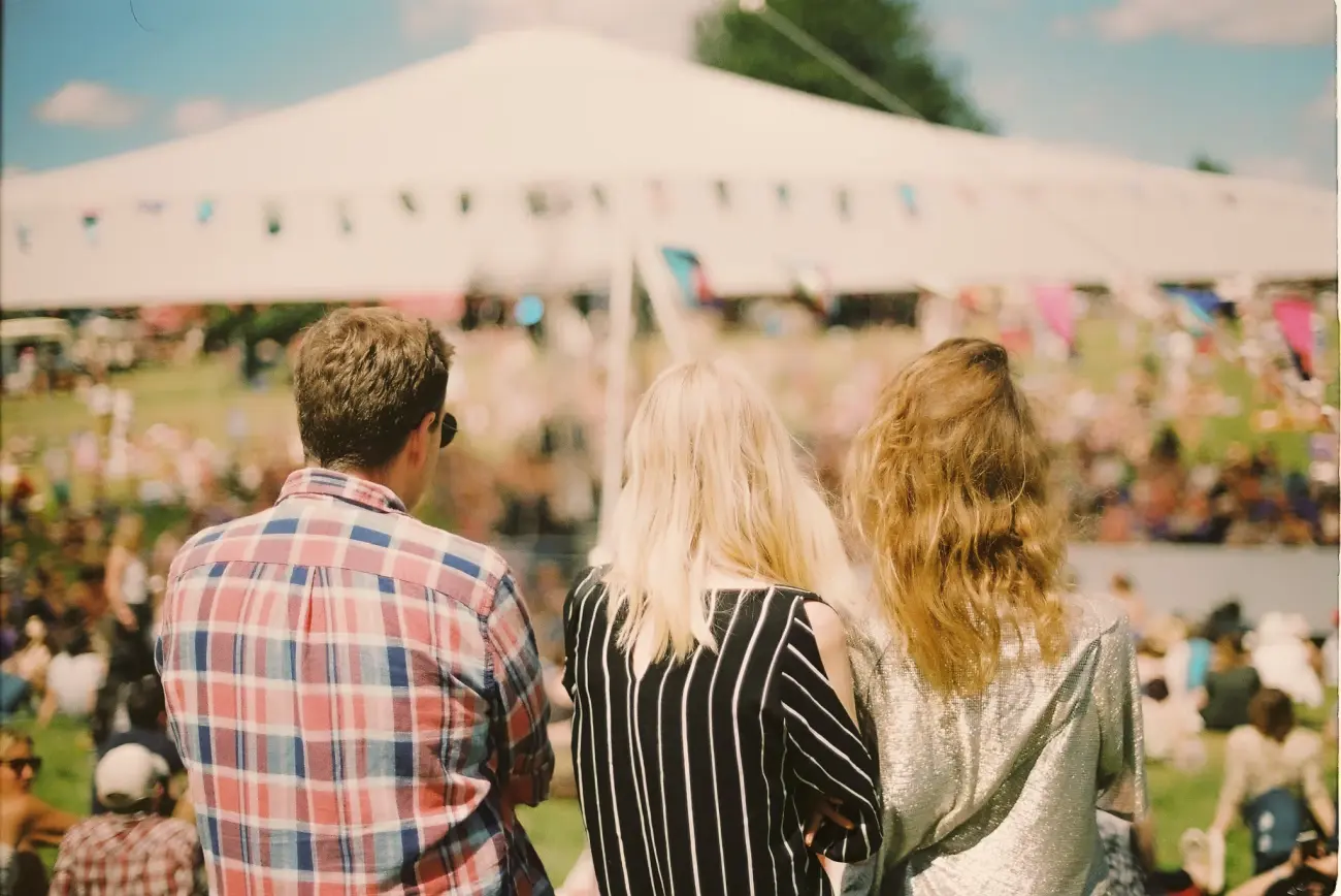 group of people observing an outdoor event