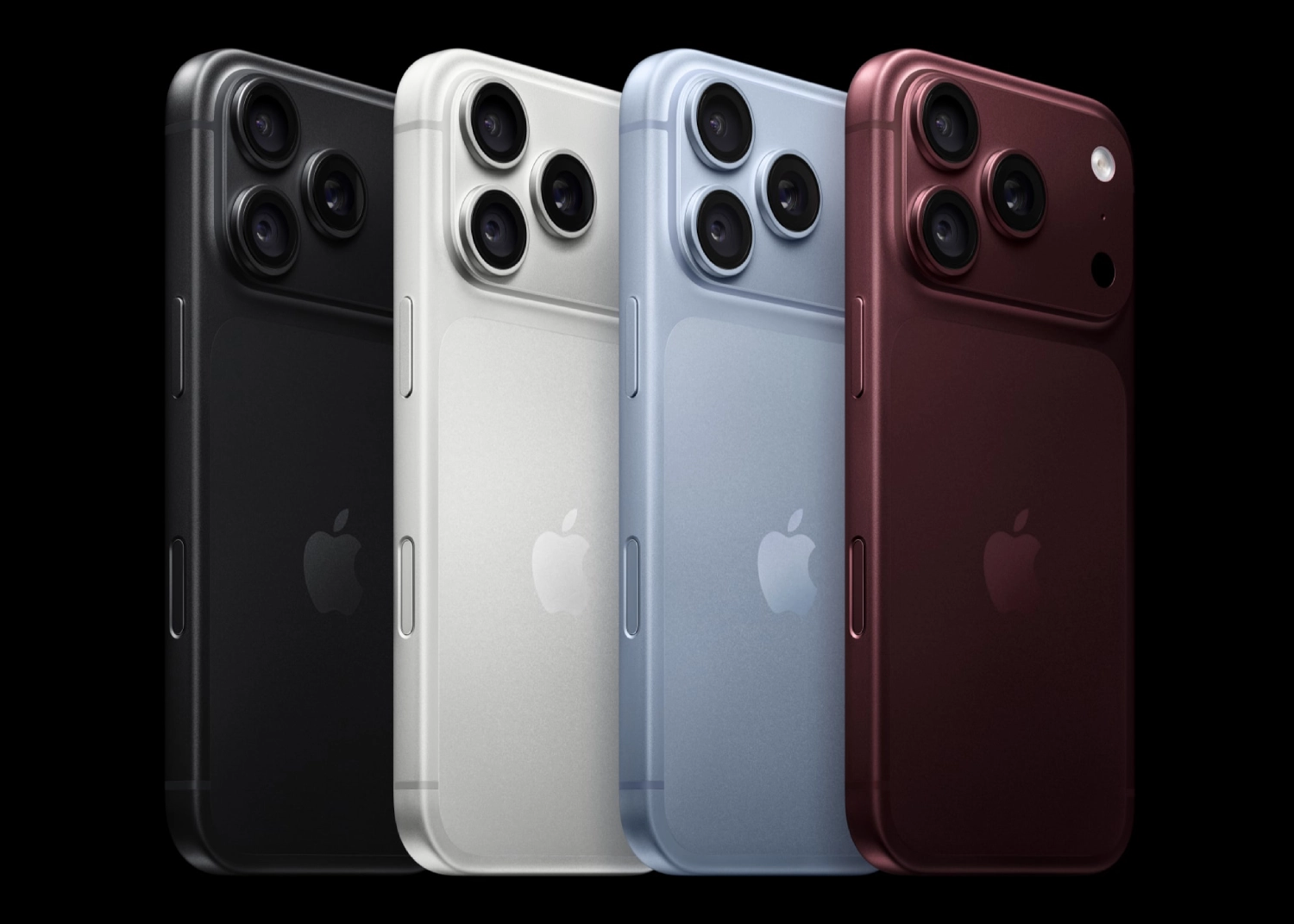 Quatro smartphones dispostos lado a lado nas cores preto, branco, azul e bordô