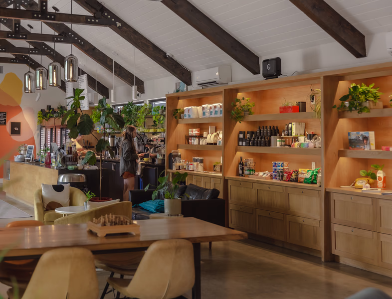 Dawn Coffee and Market interior at Bode Nashville with shelves of local goods and cafe seating