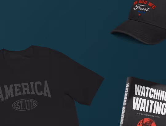 Black shirt with America est. 1776 text, black cap with In God We Trust, and a book titled Watching Waiting.