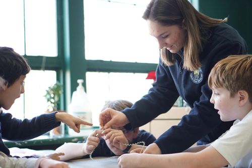 students talking in class