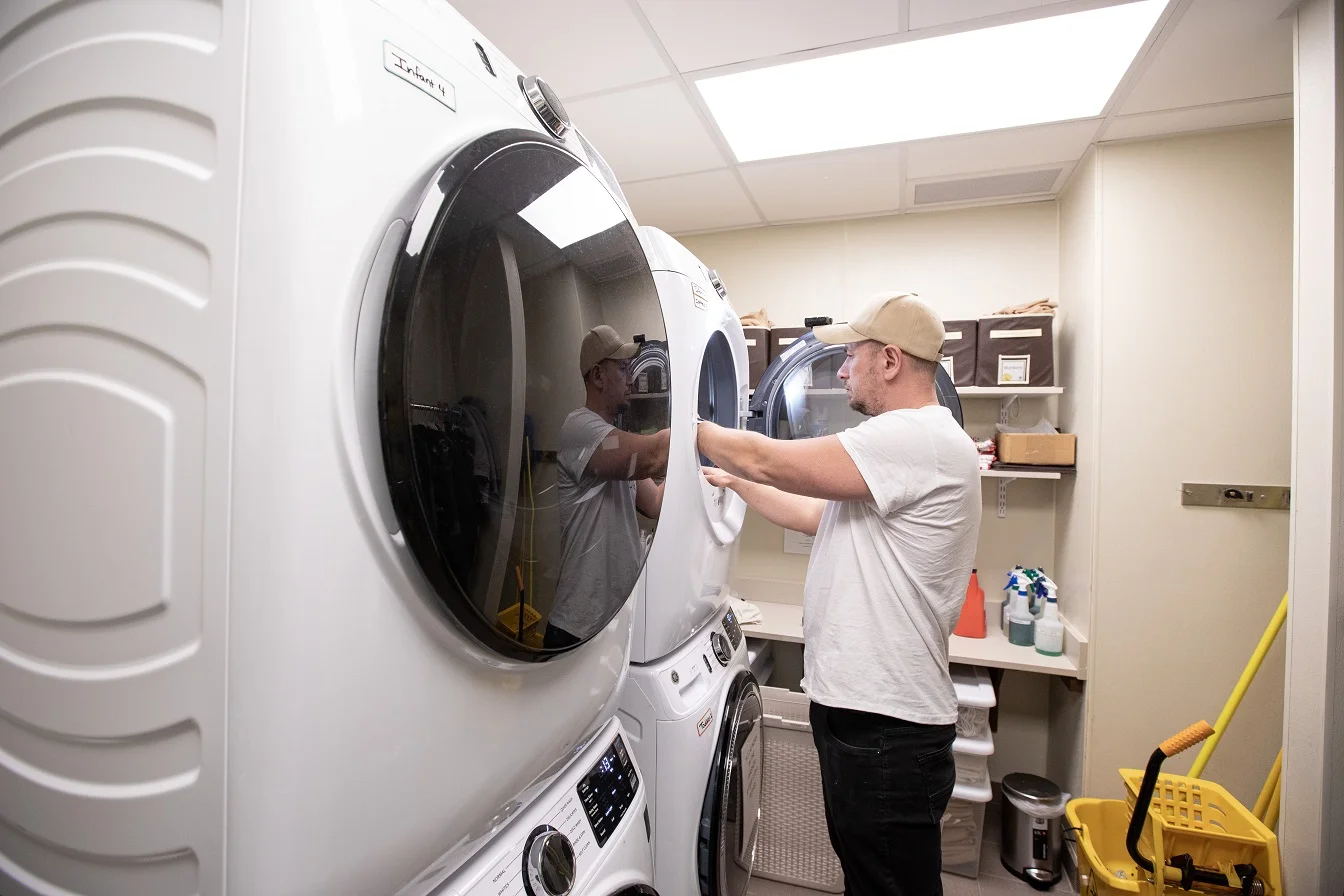 Dryer overheating inspection by appliance repair technician