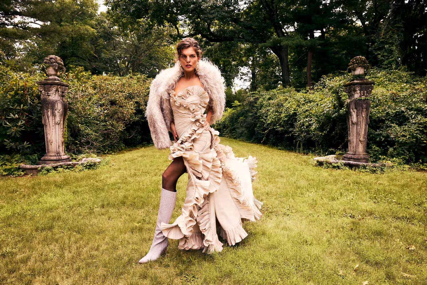 a woman in a dress posing for a picture