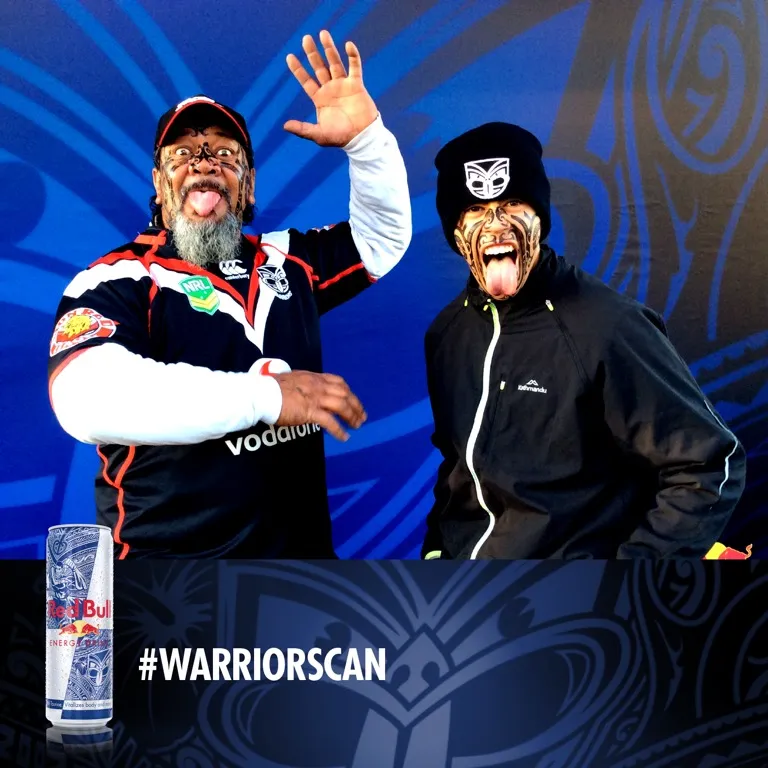 two masked men are posing for a picture