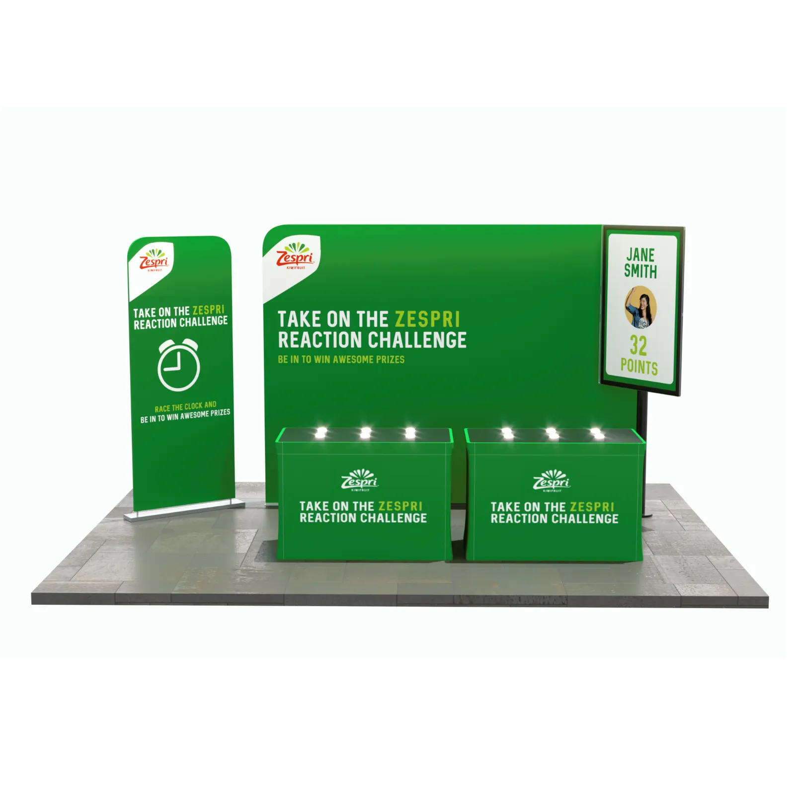Green Zespri promotional setup for the Reaction Challenge with banners, counters, and a digital score display.