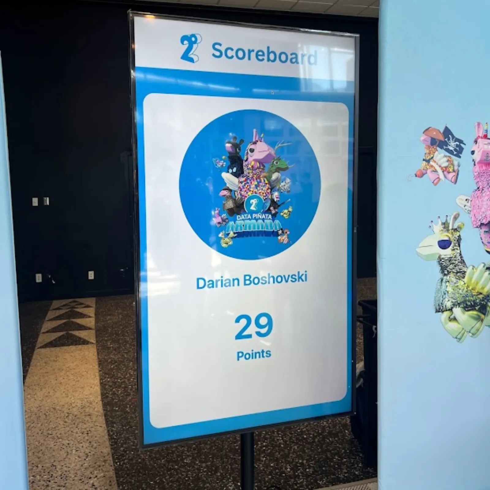 Scoreboard showing Darian Boshovski with 29 points and a colorful Data Piñata illustration.