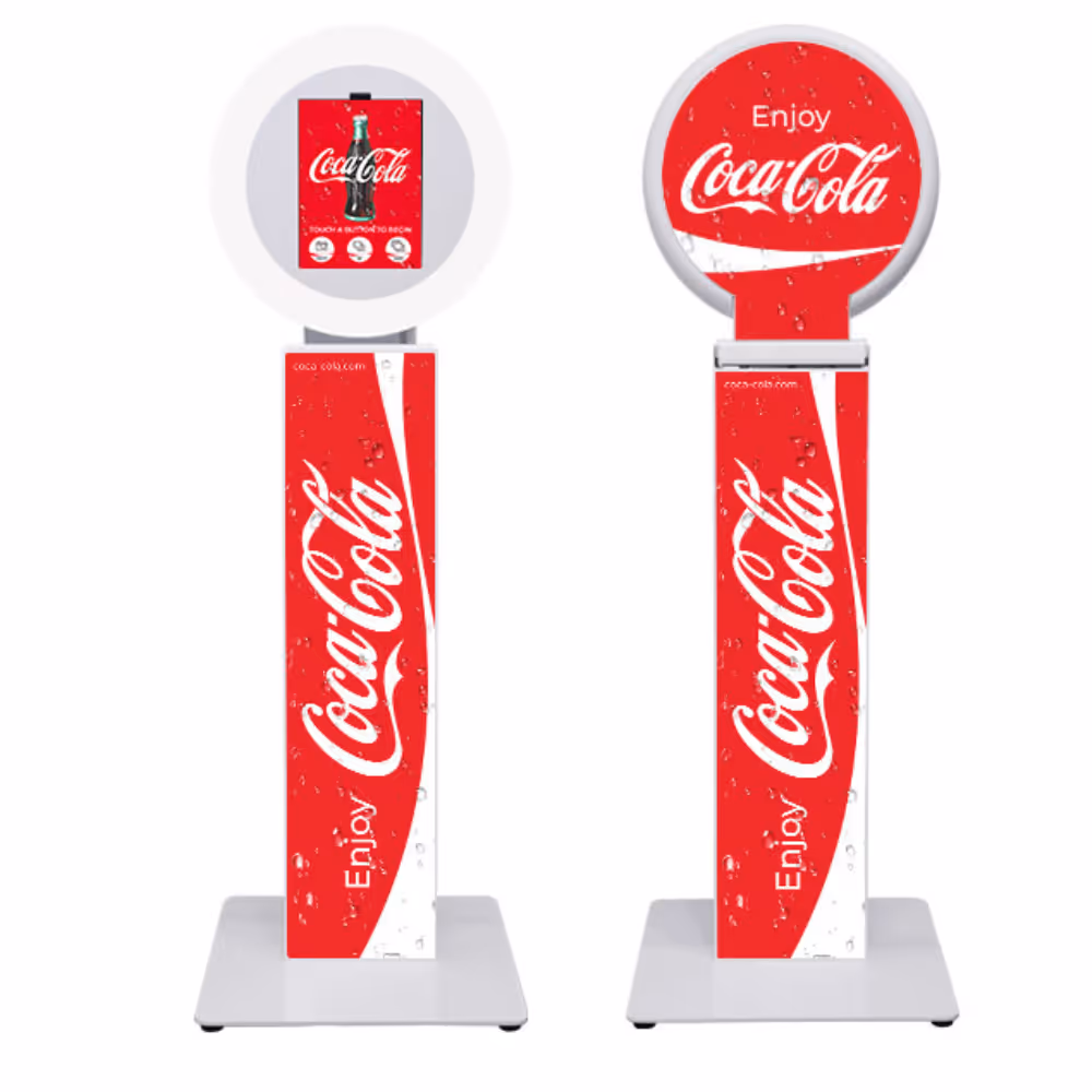 Two red Coca-Cola branded interactive kiosks with drink image and 'Enjoy Coca-Cola' text.