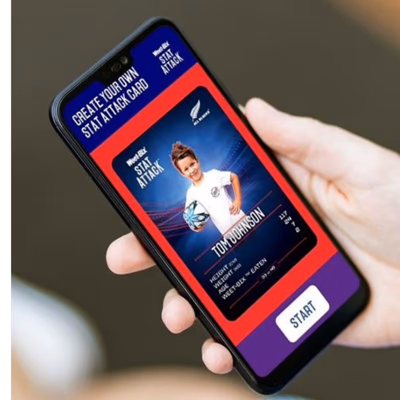 Hand holding phone showing a digital sports card for Tom Johnson with stats and a START button.