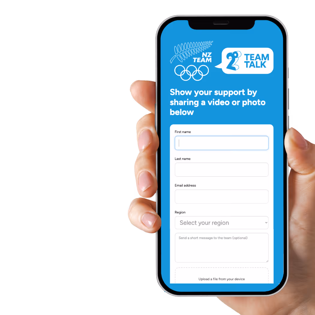 Hand holding phone showing NZ Team Talk form to share video or photo to show support.