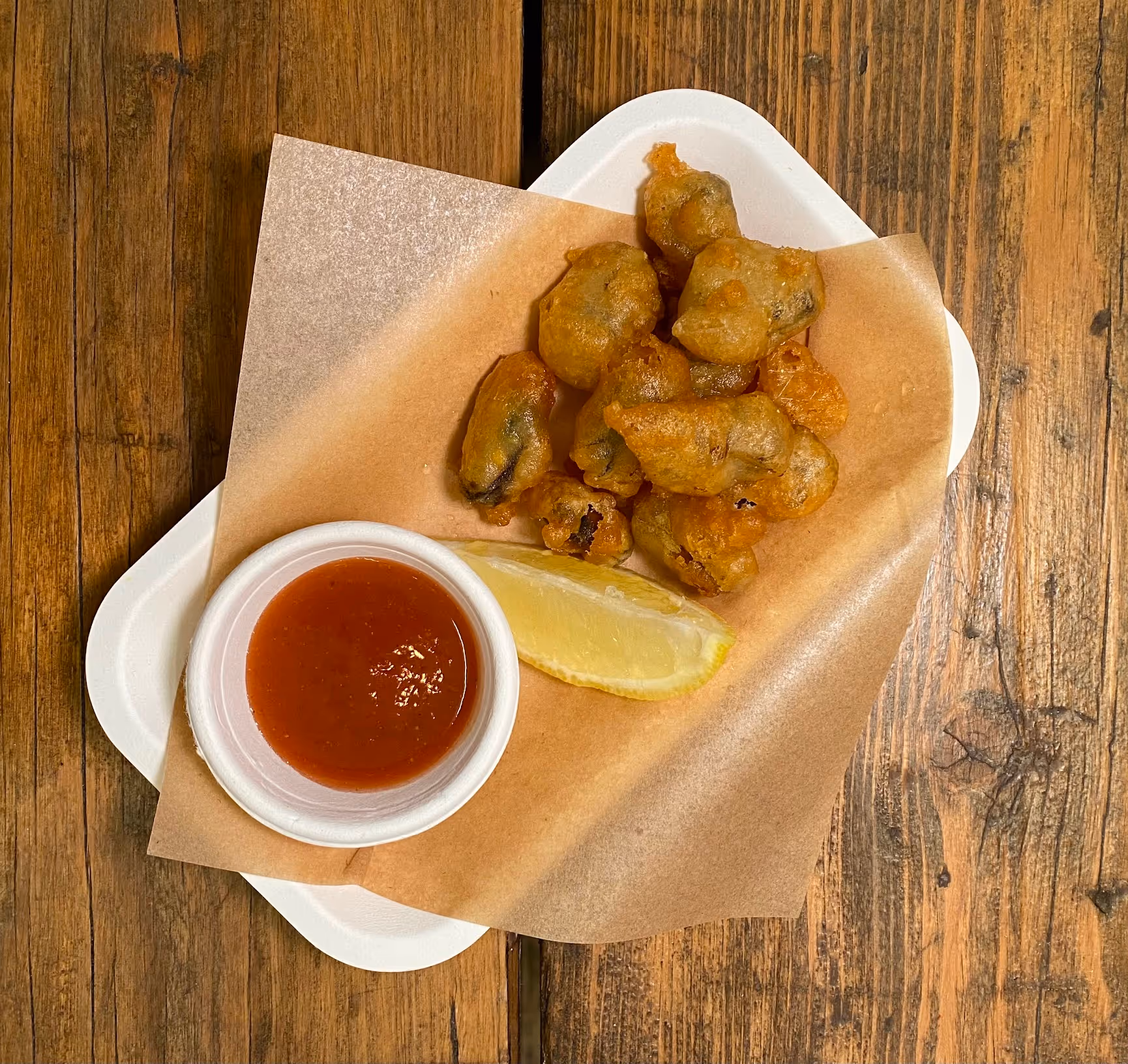 A dish by Bia on a wooden table
