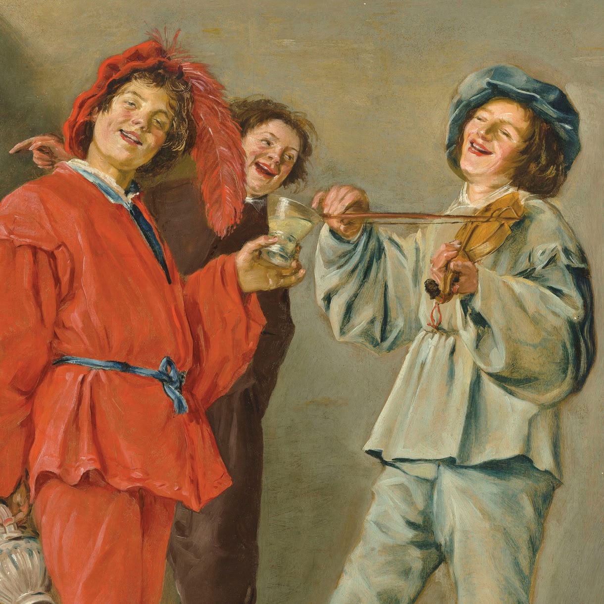 A painting by Judith Leyster made around 1629 depicting three laughing musicians, including a red-clad figure holding a glass and a violinist in pale clothing.