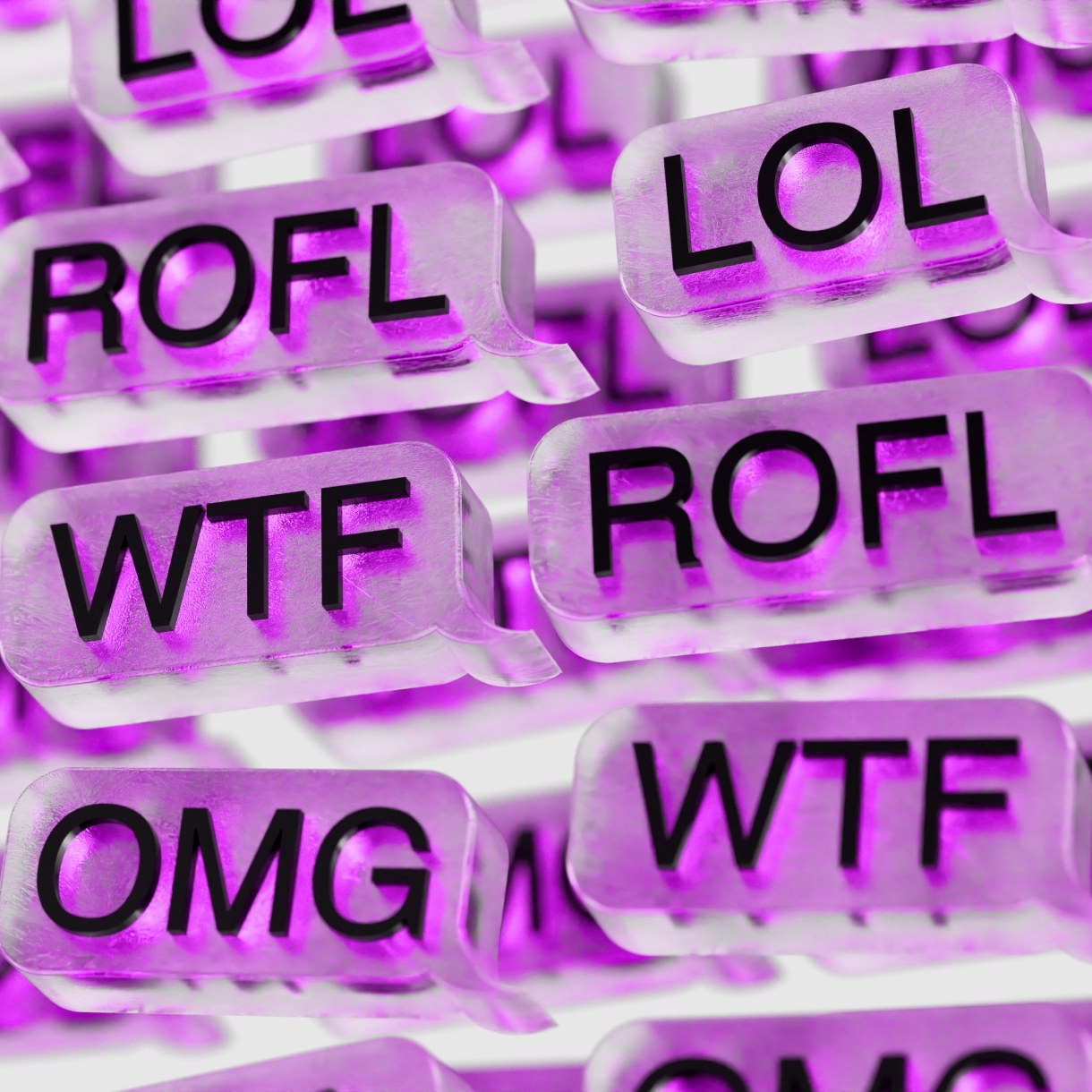 A close-up of translucent speech-bubble tiles glowing purple and white, printed with internet slang such as “LOL,” “ROFL,” “WTF,” and “OMG.”