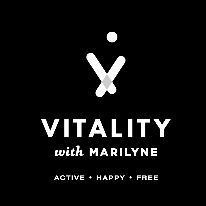 White Vitality primary logo placed on black background