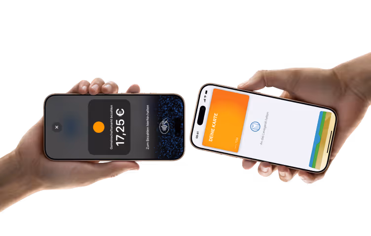 Two hands holding smartphones displaying digital payment and card apps for contactless transactions.