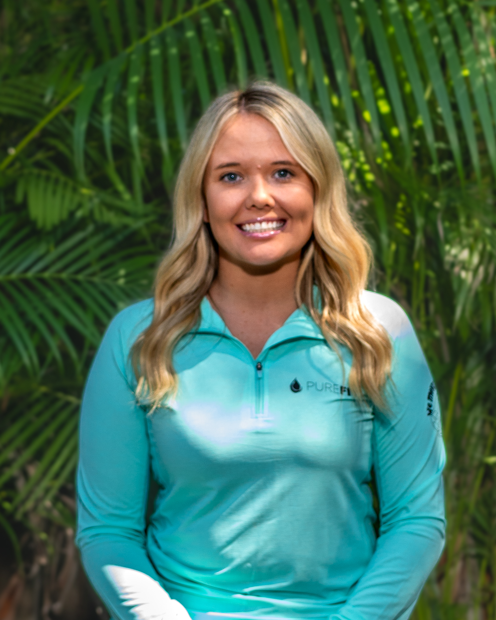 Demi in front of greenery 
