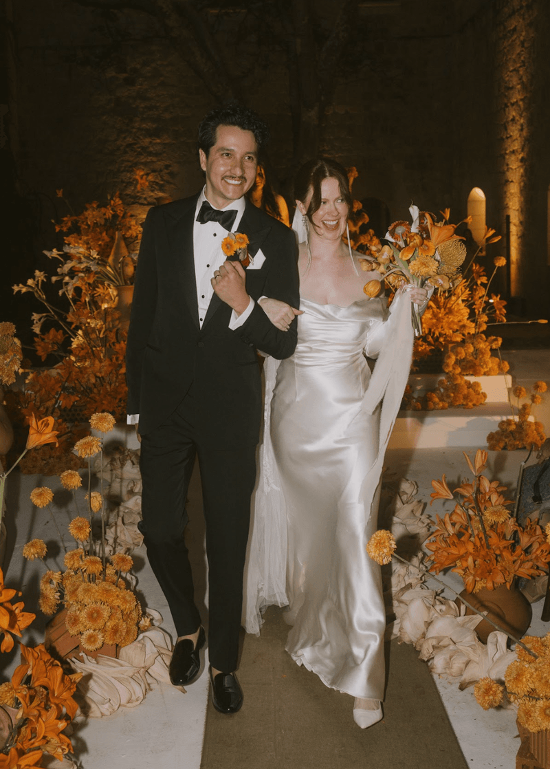 A nostalgic dream filled with warm orange hues and intimate details, bringing Sabrina and Rogelio's love story to life.