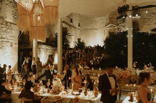 A nostalgic dream filled with warm orange hues and intimate details, bringing Sabrina and Rogelio's love story to life.