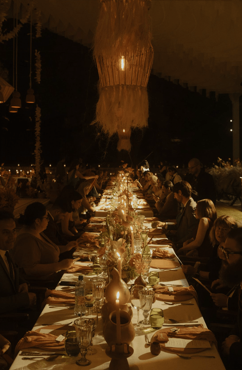 A nostalgic dream filled with warm orange hues and intimate details, bringing Sabrina and Rogelio's love story to life.