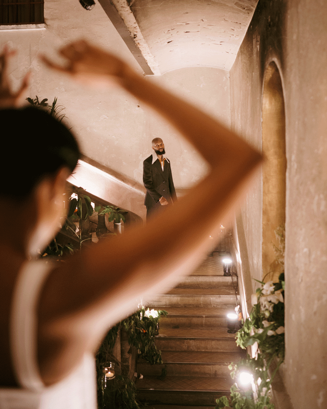 A lush celebration in a historic venue, where timeless architecture met vibrant greenery to create jungle-chic atmosphere.