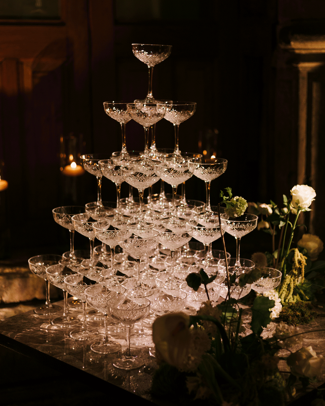 A lush celebration in a historic venue, where timeless architecture met vibrant greenery to create jungle-chic atmosphere.