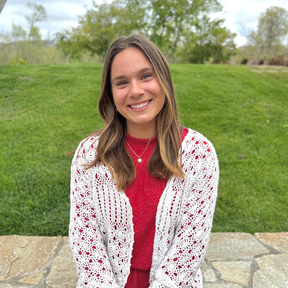 Elise Lauricella, speech-language pathologist at Speech-N-Motion in San Marcos, California, smiling outdoors.