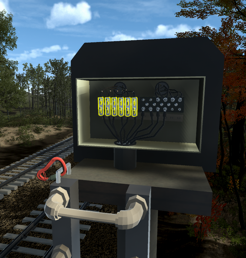 A 3D rendered scene of a fuse box at the tide of a train track within a virtual reality application. 