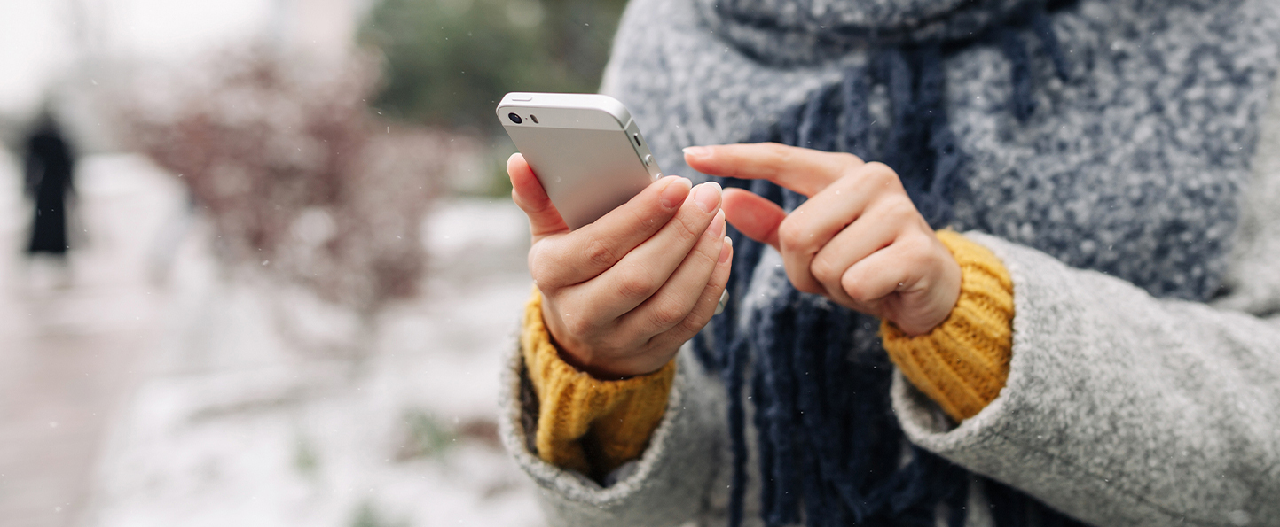 Women holding phone.