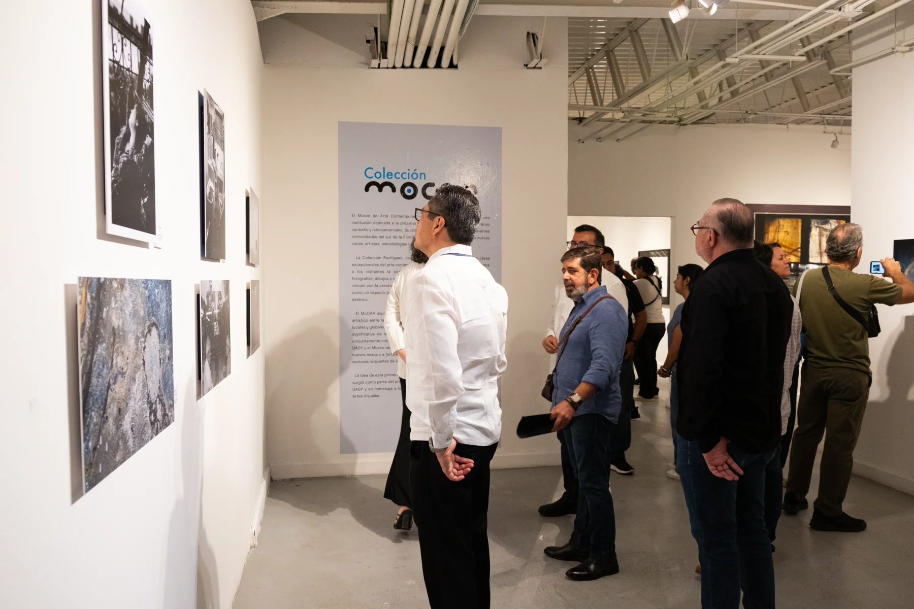 Visitors view works from the MoCAA Collection in Yucatán